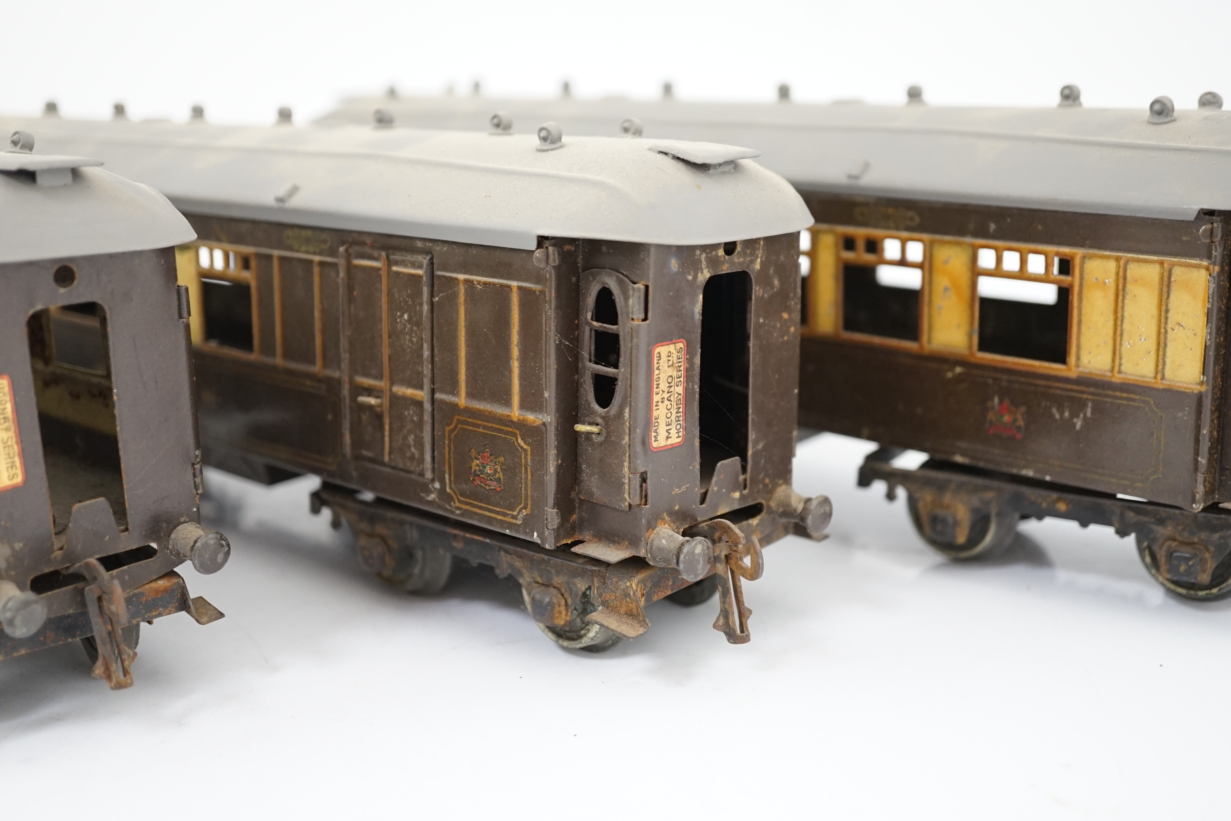 Three Hornby Series 0 gauge tinplate Pullman cars; Loraine, Arcadia and Montana